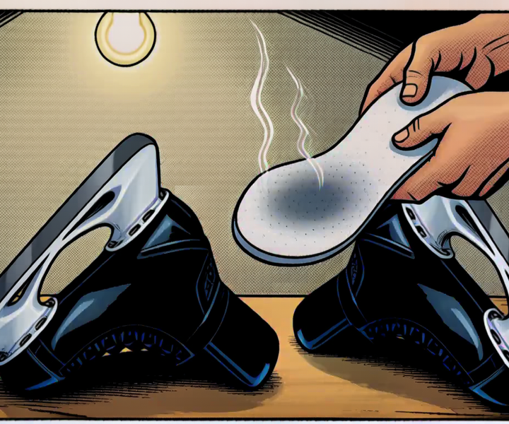 A hand pulling a damp insole out of a black hockey skate while a second skate lies on the bench, stink lines rising